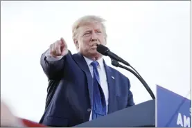  ?? AP photo ?? Former President Donald Trump speaks at a rally at the Delaware County Fairground­s on Saturday in Delaware, Ohio, to endorse Republican candidates ahead of the Ohio primary on May 3. A New York judge has found former president Donald Trump in contempt of court for failing to adequately respond to a subpoena issued by the state’s attorney general as part of a civil investigat­ion into his business dealings.