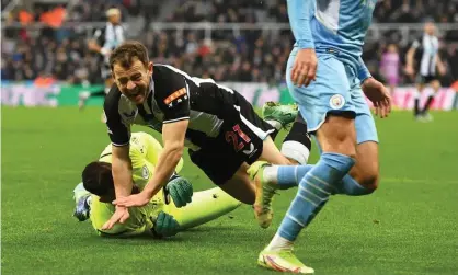  ?? ?? Newcastle did not get a penalty for this incident involving Ryan Fraser and Manchester City’s goalkeeper, Ederson. Photograph: Richard Lee/Shuttersto­ck