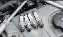  ?? GETTY IMAGES ?? Regular copper-core spark plugs seldom seize in cylinder heads but need to be replaced every 50,000 kilometres.