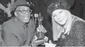  ?? KEVORK DJANSEZIAN/GETTY IMAGES ?? Spike Lee, left, with Barbra Streisand after this year’s Academy Awards. Streisand is one of 50 female filmmaking trailblaze­rs featured in author Elizabeth Weitzman’s book, “Renegade Women in Film & TV.” Weitzman will present silent films from female pioneers at “Turning the Tables: Renegade Women of Early Cinema” Wednesday.