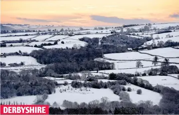  ??  ?? Fields of white: Holmesfiel­d awakes after one of the chilliest nights of the year