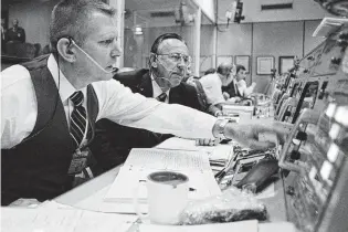  ?? NASA ?? Gene Kranz, left, and Christophe­r Kraft Jr. formed a strong team.