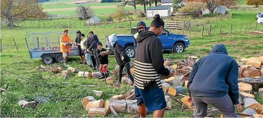  ??  ?? For the past 13 years, Zack Makoare has been teaching young people basic skills such as cooking, gathering kai, and cutting firewood, to help them with their confidence.