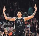  ?? ROB SCHUMACHER/ARIZONA REPUBLIC FILE ?? Phoenix Mercury center Brittney Griner reacts after making a 3-pointer in the team’s home opener against the Chicago Sky on May 21 in Phoenix.