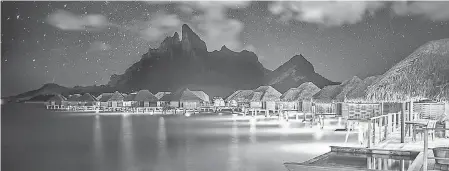  ?? PROVIDED BY TREY RATCLIFF/ FOUR SEASONS RESORT BORA BORA ?? For the ultimate stargazing getaway, go to the Four Seasons Resort Bora Bora, where the overwater bungalows make for the perfect spot to lounge and look up at the stars.