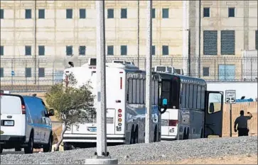  ?? James Quigg Victor Valley Daily Press ?? A BUS carrying immigrant detainees enters a federal prison in Victorvill­e. Sikh asylum seekers, as well as those of other faiths, have complained of conditions that don’t allow them to freely practice their religion.