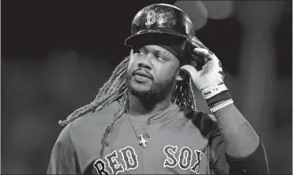  ?? CHARLES KRUPA/AP PHOTO ?? Hanley Ramirez of the Red Sox takes off his helmet after grounding out in a game on Sept. 29, 2017.