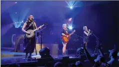  ?? KEVIN MAZUR — GETTY IMAGES ?? Emily Strayer (from left), Natalie Maines and Martie Maguire of The Chicks perform onstage as The Chicks 2022Tour kicked off at Hollywood Casino Amphitheat­er on June 14in Maryland Heights, Mo.