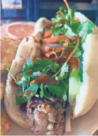  ?? COURTESY OF MEKONG CAFE ?? Sai Oua Banh Mi is a family recipe at Mekong Cafe.