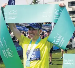  ?? PHOTOS: TRACEY ROXBURGH ?? Top effort . . . Queenstown Marathon winner David Haunschmid­t, of Tauranga, who crossed the finishline in 2hr 39min 40sec.