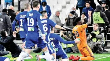  ?? - AFP photo ?? Strasbourg knocked Marseille out of the League Cup on penalties.