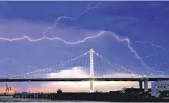  ?? AP PHOTO/NOAH BERGER ?? Lightning forks over the San FranciscoO­akland Bay Bridge as a storm passes over Oakland, Calif. on Aug. 16.