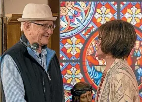  ??  ?? Norman Lear discusses a scene with Rita Moreno on the set of the show.