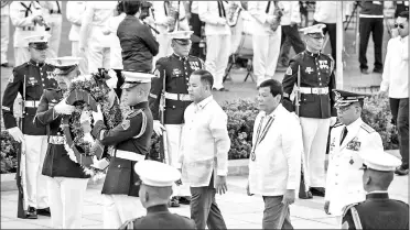  ??  ?? Philippine President Rodrigo Duterte (second right) attends the commemorat­ion of the 121st death anniversar­y of the country’s national hero Jose Rizal at the Rizal Monument in Manila. Rizal was sentenced to die by a firing squad by the Spanish after he...