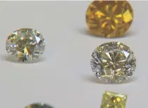  ?? Reuters ?? Synthetic diamonds on display at De Beers’ Internatio­nal Institute of Diamond Grading and Research