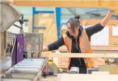  ??  ?? WOMEN AT WORK: Aimee Bascombe, left, and Sarah Gall are valued workers at Stewart Milne Timber Systems