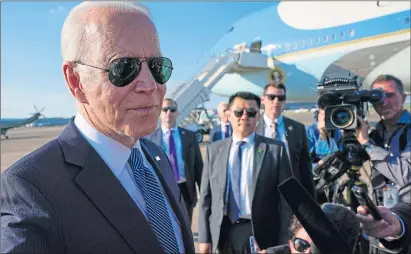  ??  ?? US president Joe Biden speaks to reporters before boarding Air Force One at Heathrow on Sunday