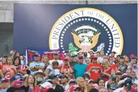  ?? ANNA MONEYMAKER/NEW YORK TIMES FILE PHOTO ?? Supporters wait July 3 for President Donald Trump to come onstage at a rally in Keystone, S.D. As growing numbers of leading elected officials express wariness about attending the Republican National Convention next month in Jacksonvil­le, Fla., a strong contingent of Republican National Committee members say they still plan to go.