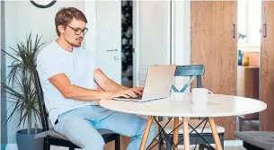  ?? DREAMSTIME ?? There are downsides to working from home, including a lack of social and creative interactio­ns with colleagues, that hamper morale, Creig Lamb and Daniel Safayeni write.