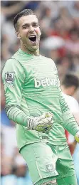  ?? AP PHOTOS ?? West Ham’s goalkeeper Adrian celebrates after his team scored during the English Premier League football match against Arsenal at the Emirates stadium in London yesterday.