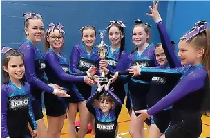  ?? ?? Victorious cheerleadi­ng team Infinity