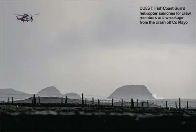  ??  ?? QUEST: Irish Coast Guard helicopter searches for crew members and wreckage from the crash off Co Mayo