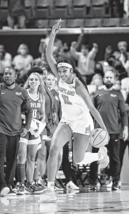  ?? Greg Fiume / Getty Images ?? Maryland’s Angel Reese celebrates after the Terrapins held on for a 79-76 victory over Baylor on Sunday at College Park, Md.