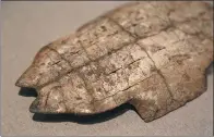  ?? ZUO DONGCHEN / FOR CHINA DAILY ?? An oracle bone shown at the National Museum of Chinese Writing in Anyang, Henan province.