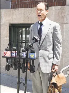 ?? Peter Hvizdak / Hearst Connecticu­t Media ?? Attorney Michael Dolan makes a statement Friday outside state Superior Court in Rockville following the arraignmen­t of his client, Peter Manfredoni­a.