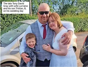  ?? ?? The late Tony David Gray with wife Lorraine and his son Tristan, 8, on his wedding day