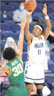  ?? KEITH LUCAS/SIDELINE MEDIA ?? Old Dominion’s A.J. Oliver puts up a shot against Charlotte’s Jhery Matos during a Conference USA basketball game Saturday in Norfolk.