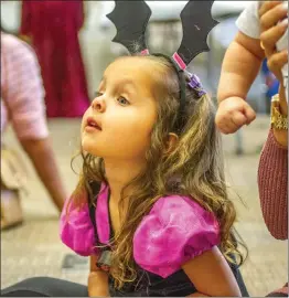  ?? Michele Lutes/The Signal ?? Makena Pacheco, 3 listens to the reading of “Meet Miss Patootie.”