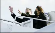  ?? JACQUELYN MARTIN — THE ASSOCIATED PRESS ?? Vice President Kamala Harris and her husband, Doug Emhoff, wave as they board Air Force Two at Andrews Air Force Base, Md., Monday, March 15, en route to Las Vegas.