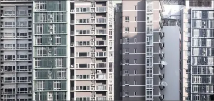  ?? PICTURE: BLOOMBERG ?? Residentia­l buildings in Beijing. Chinese President Xi Jinping is pushing a housing model to focus on renting to put a check on rocketing property prices.