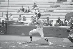  ?? Staff photo by Evan Lewis ?? Pleasant Grove’s Heath Ferguson drives in the Hawks’ winning run in the eighth inning of Game 2 in the Region II-4A final with Decatur on Thursday at Mike Carter Field in Tyler, Texas. The Hawks beat the Eagles, 1-0, to advance to the state tournament...