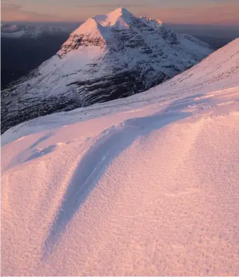  ?? ?? [below] Golden light on Beinn Eighe. A ‘leading line’ such as in this photo can help draw the viewer’s eye into the image