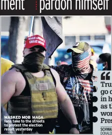  ??  ?? MASKED MOB MAGA fans take to the streets to protest the election result yesterday