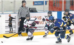  ??  ?? Dundee Stars U/16’s Luca De Simone (left) starts another attack against the Fife Flames goal.