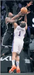  ?? N.Y. Post: Charles Wenzelberg ?? FAIR FOUL:Dorian FinneySmit­h fouls James Harden during the Nets’ loss in Game 3 of their playoff series versus the 76ers.