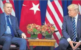  ?? AFP FILE ?? Growing distance: Turkey President Recep Tayyip Erdogan and US President Donald Trump wait for a meeting at the Palace Hotel during the UN General Assembly in New York in September.