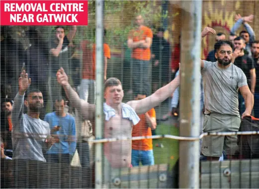  ?? ?? Support: Detainees at Brook House immigratio­n removal centre raised their arms, shouted and chanted with protesters