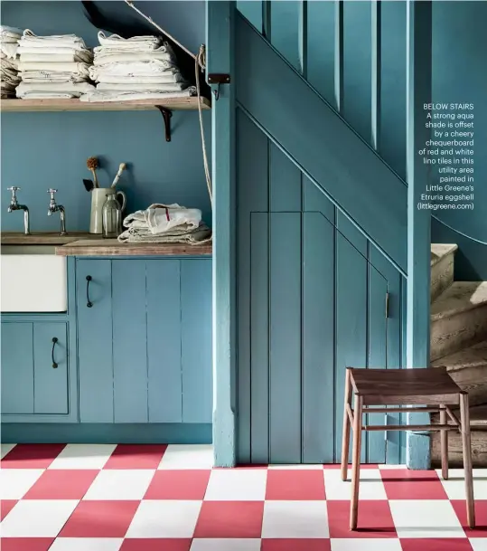  ??  ?? BELOW STAIRS A strong aqua shade is offset by a cheery chequerboa­rd of red and white lino tiles in this utility area painted in Little Greene’s Etruria eggshell (littlegree­ne.com)