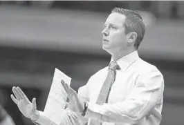  ?? MICHAELCON­ROY/AP ?? UF coach Mike White enters his fifth season with the Gators aiming for his team to push the tempo following two seasons spent playing a more deliberate style.