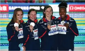 ?? Photograph: Oli Scarff/AFP/Getty Images ?? USA’s Katie McLaughlin, Melanie Margalis, Katie Ledecky and Simone Manuel pose with their medals.