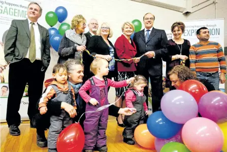  ?? JASON BAIN/EXAMINER ?? Kawartha Pine Ridge District School Board, City of Peterborou­gh and Pearson Day Care Centre representa­tives cut the ribbon on the new location of the facility at Peterborou­gh Alternativ­e and Continuing Education (PACE) at PCVS on McDonnel St. during a...