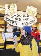  ?? — NICK PROCAYLO ?? Protesters express their views at Monday’s hearing for Kinder Morgan protesters at B.C. Supreme Court in Vancouver.