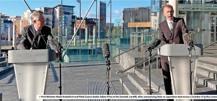  ?? ?? > First Minister Mark Drakeford and Plaid Cymru leader Adam Price at the Senedd, Cardiff, after announcing their co-operation deal across a number of policy areas