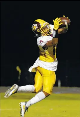  ??  ?? Tyner’s Jeremiah Batiste intercepts an East Hamilton pass Friday.