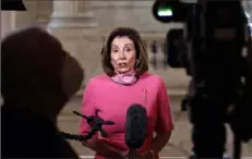  ?? Patrick Semansky/Associated
Press ?? House Speaker Nancy Pelosi, of Calif., speaks to reporters Wednesday on Capitol Hill in Washington.