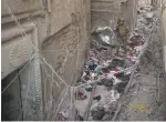  ?? FELIPE DANA/AP ?? An Iraqi Special Forces soldier walks on clothes left behind by fleeing civilians in an alley Wednesday as Iraqi forces continue their advance against Islamic State militants in Mosul.